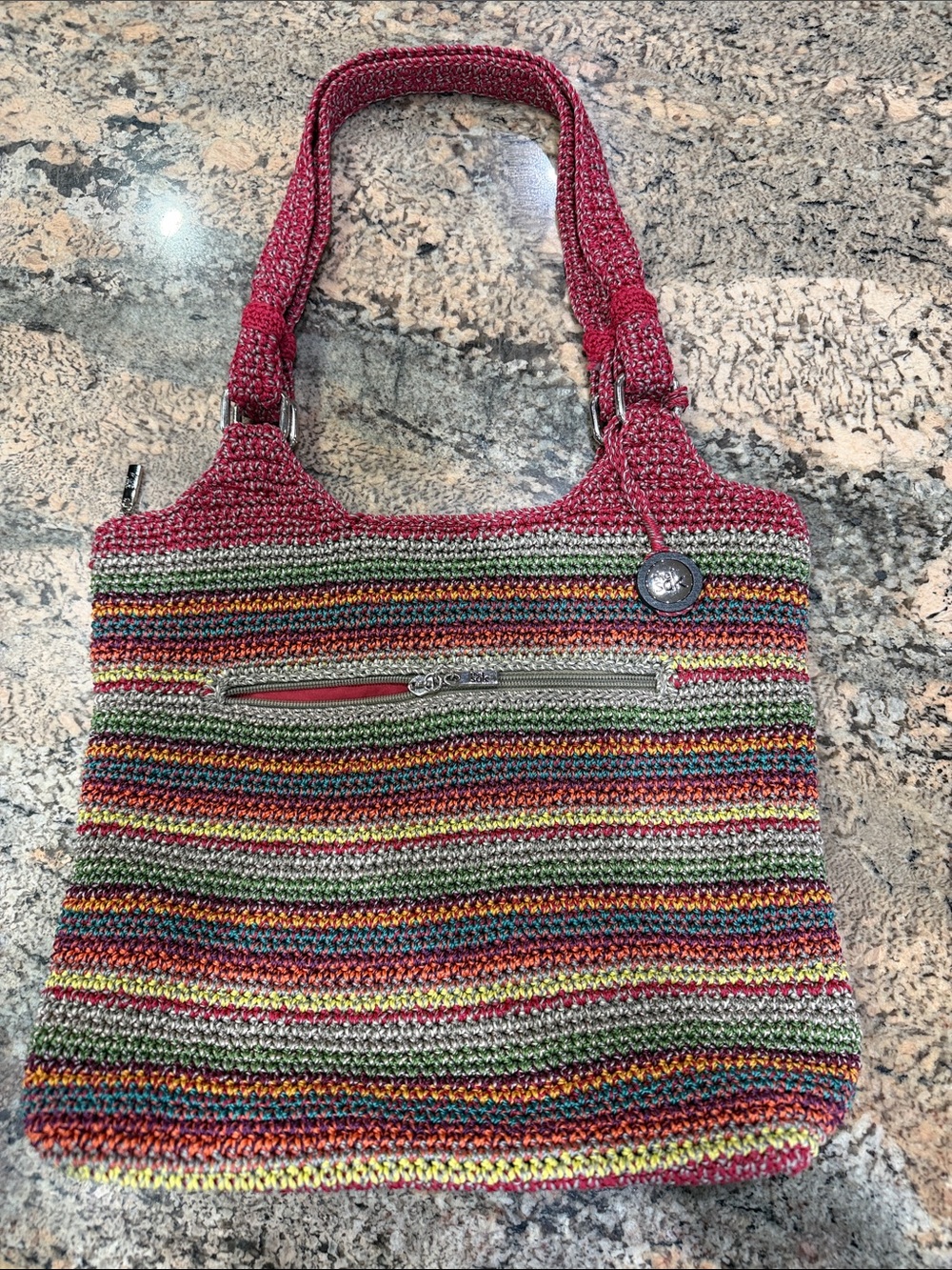 The Sak Multicolor Striped Crochet Shoulder Bag with Pink Handles